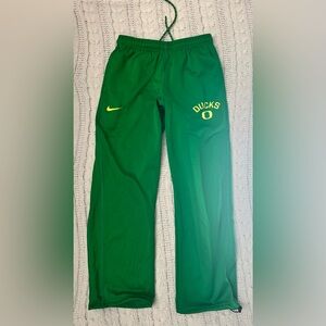 Nike Green Sweatpants with Yellow Ducks Logo
